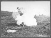 Rebentamento de granada de artilharia.